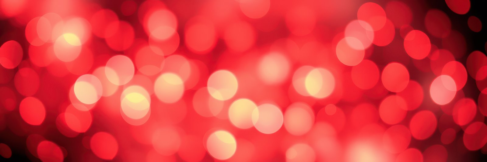 Bright red bokeh lights create a festive and cheerful atmosphere for celebrations or events